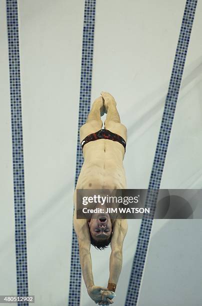 Vincent Riendeau of Canada competes in the Men's 10M Platform Preliminary at the 2015 Pan American Games in Toronto, Canada, July 12, 2015. AFP...