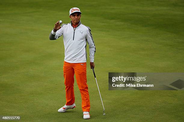 Rickie Fowler of the United States waves on the 18th green during the final round of the Aberdeen Asset Management Scottish Open at Gullane Golf Club...