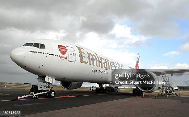 Arsenal FC branded Emirates plane as they travel to Singapore for the Barclays Asia Trophy at Stansted Airport on July 12, 2015 in London, England.