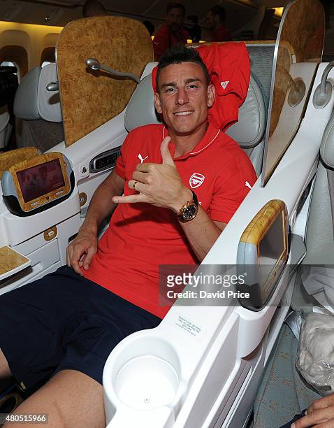 Laurent Koscielny of Arsenal on the Emirates plane at Stansted Airport on July 12, 2015 in London, England.