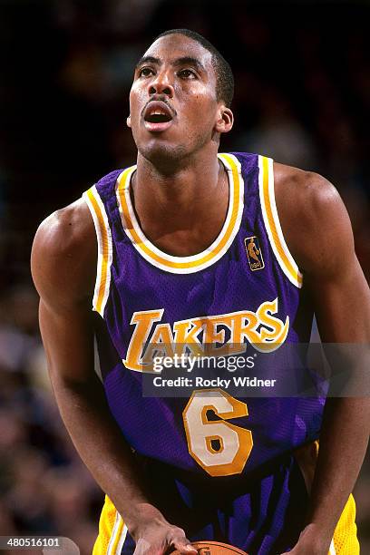 Eddie Jones of the Los Angeles Lakers shoots a foul shot circa 1997 at Key Arena in Seattle, Washington. NOTE TO USER: User expressly acknowledges...