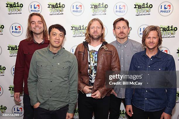 Drew Shirley, Jerome Fontamillas, Jon Foreman, Chad Butler and Tim Foreman of Switchfoot pose at Radio 104.5 Performance Theater March 25, 2014 in...