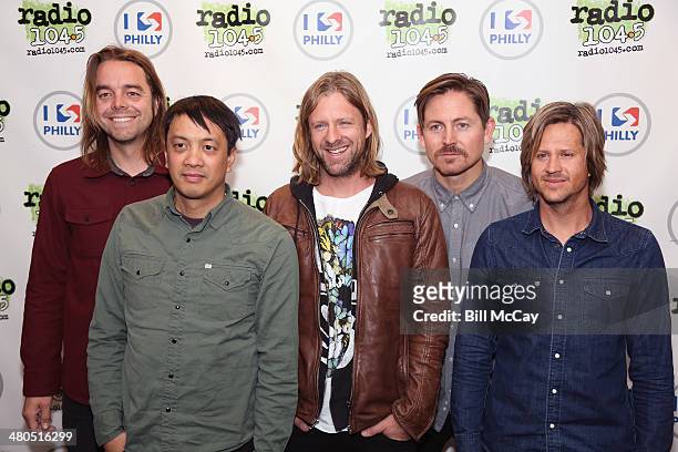 Drew Shirley, Jerome Fontamillas, Jon Foreman, Chad Butler and Tim Foreman of Switchfoot pose at Radio 104.5 Performance Theater March 25, 2014 in...