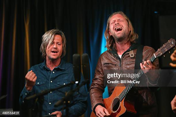Tim Foreman and Jon Foreman of Switchfoot perform at Radio 104.5 Performance Theater March 25, 2014 in Bala Cynwyd, Pennsylvania.