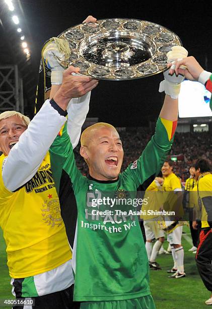 Takanori Sugeno of Kashiwa Reysol celebrates the season champion after the J.League match between Urawa Red Diamonds and Kashiwa Reysol at Saitama...