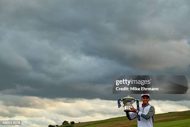 Rickie Fowler of the United States celebrates with the trophy during the trophy presentation after winning the Aberdeen Asset Management Scottish...