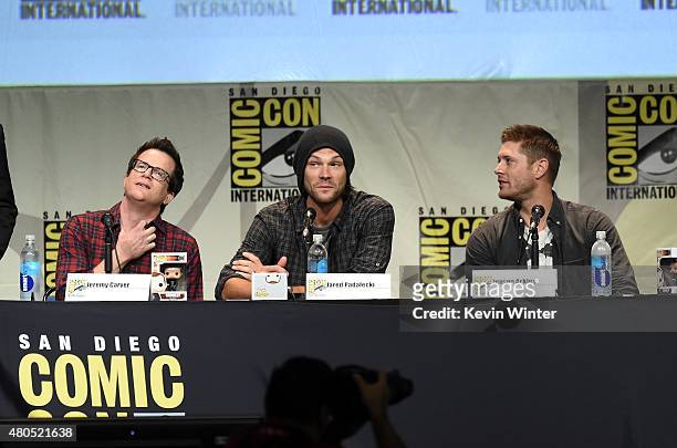 Executive producer/writer Jeremy Carver, actors Jared Padalecki and Jensen Ackles speak onstage at the "Supernatural" panel during Comic-Con...
