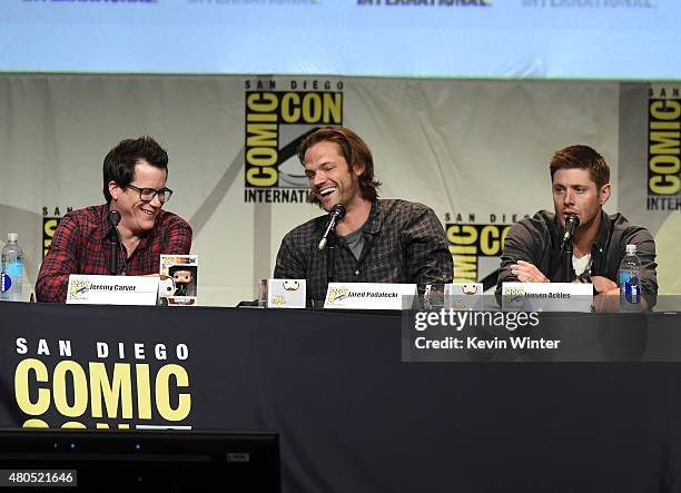 Executive producer/writer Jeremy Carver, actors Jared Padalecki and Jensen Ackles speak onstage at the "Supernatural" panel during Comic-Con...