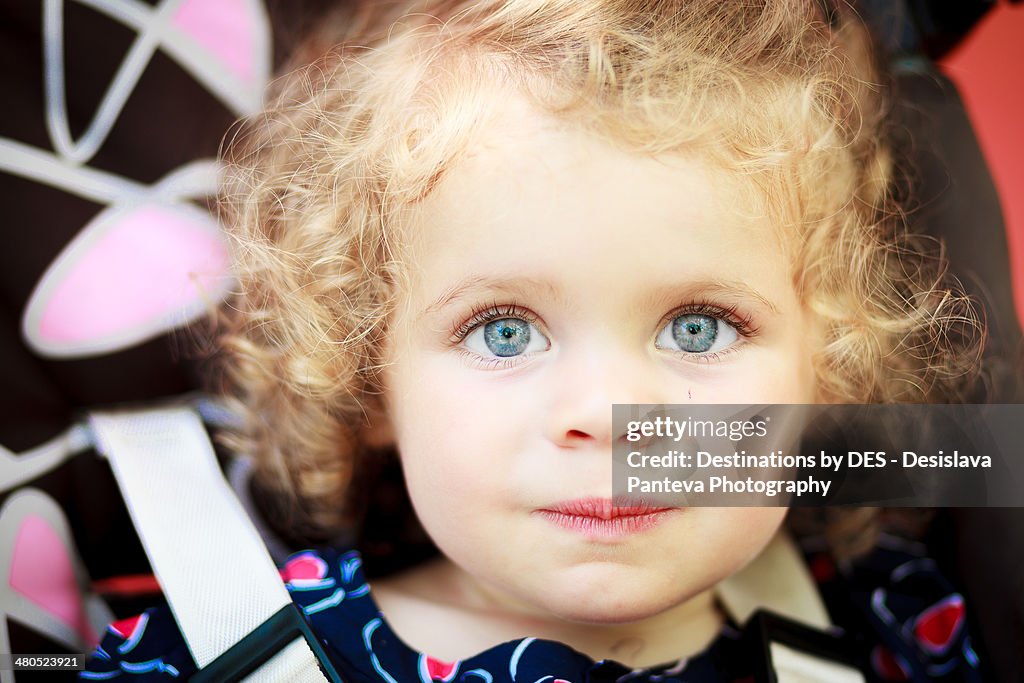 Curly blond baby girl