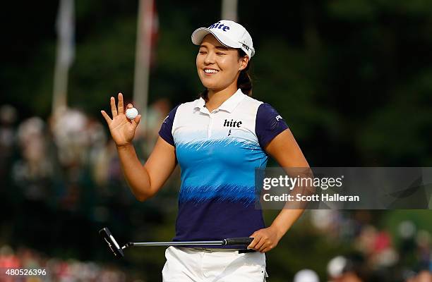 In Gee Chun of South Korea waves to the gallery after a birdie on the 17th hole during the final round of the U.S. Women's Open at Lancaster Country...