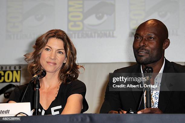 Actors Rya Kihlstedt and Jimmy Jean-Louis speak onstage at the "Heroes Reborn" exclusive extended trailer and panel during Comic-Con International...