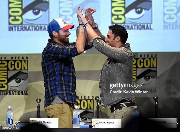 Actors Zachary Levi and Ryan Guzman greet onstage at the "Heroes Reborn" exclusive extended trailer and panel during Comic-Con International 2015 at...