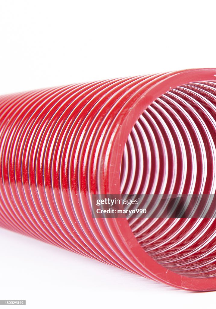 Red plastic coiled