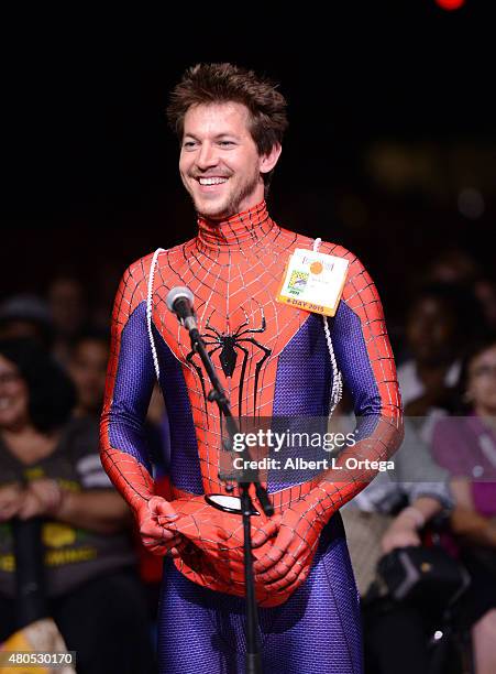 Cosplayer Matt Burrows, portraying Spider-Man, attends the "Heroes Reborn" exclusive extended trailer and panel during Comic-Con International 2015...