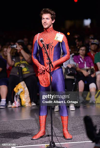 Cosplayer Matt Burrows, portraying Spider-Man, attends the "Heroes Reborn" exclusive extended trailer and panel during Comic-Con International 2015...