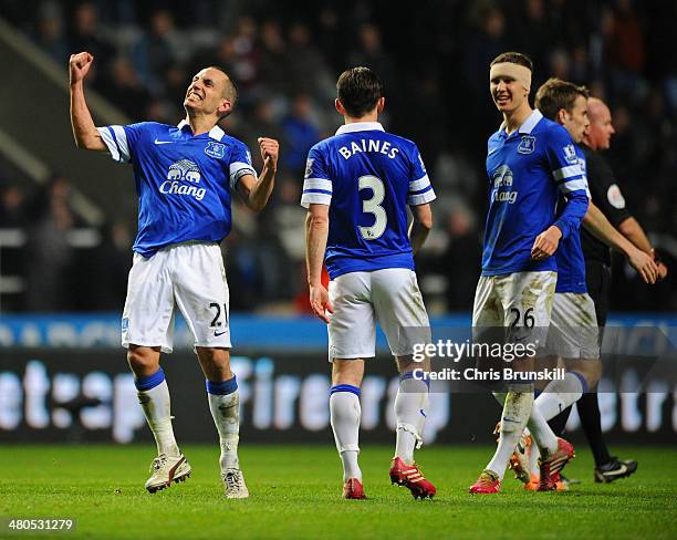 Leon Osman of Everton celebrates scoring their third goal during the Barclays Premier League match between Newcastle United and Everton at St James'...