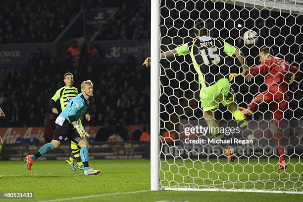 Leicester goalkeeper Kasper Schmeichel takes a shot at goal, which was headed into the net by his team-mate Chris Wood to make it 1-1 during the Sky...