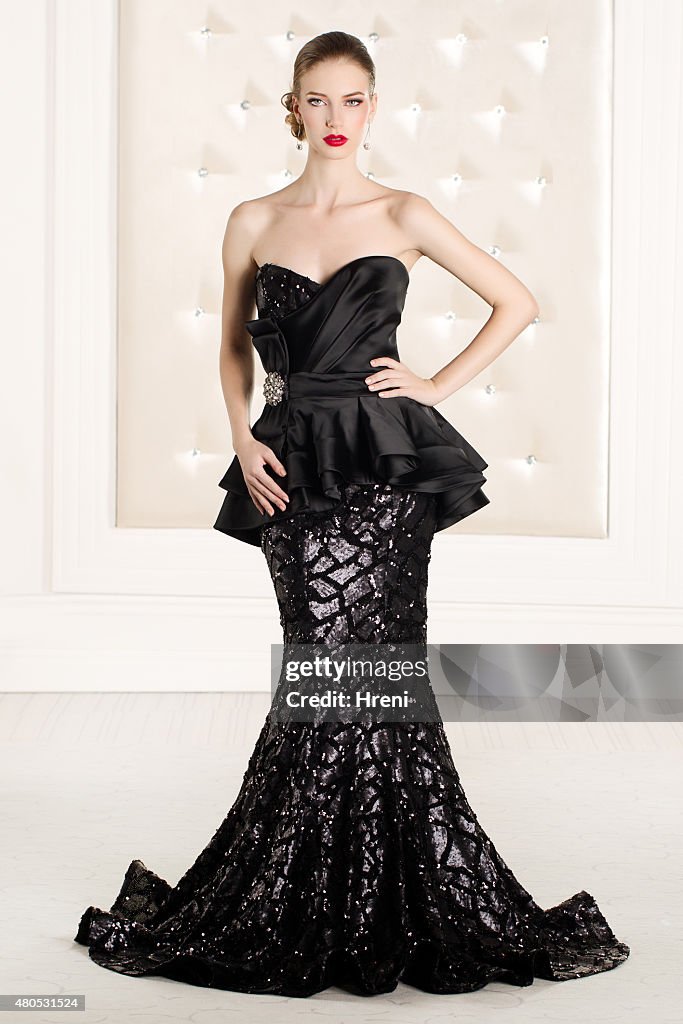 Beautiful woman wearing black elegant dress