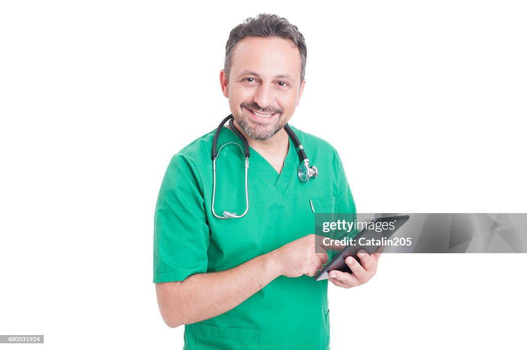 Friendly medical consultant holding tablet