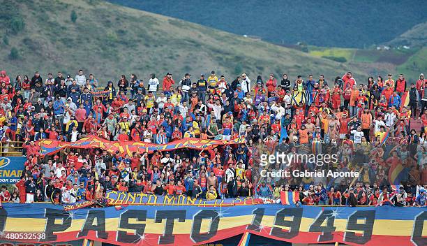 Fans of Deportivo Pasto cheer for their team during a match between Deportivo Pasto and Millonarios as part of 1st round of Liga Aguila II 2015 at...