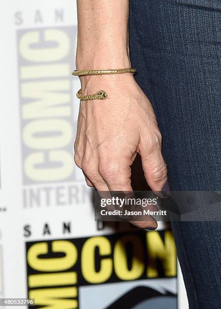 Actress Rya Kihlstedt, jewelry detail, attends "Heroes Reborn" Press Room during Comic-Con International 2015 at Hilton Bayfront on July 12, 2015 in...