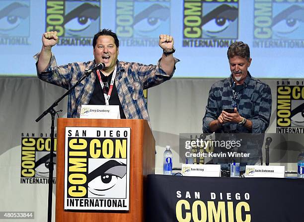 Actor Greg Grunberg and writer/producer Tim Kring speak onstage at the "Heroes Reborn" exclusive extended trailer and panel during Comic-Con...