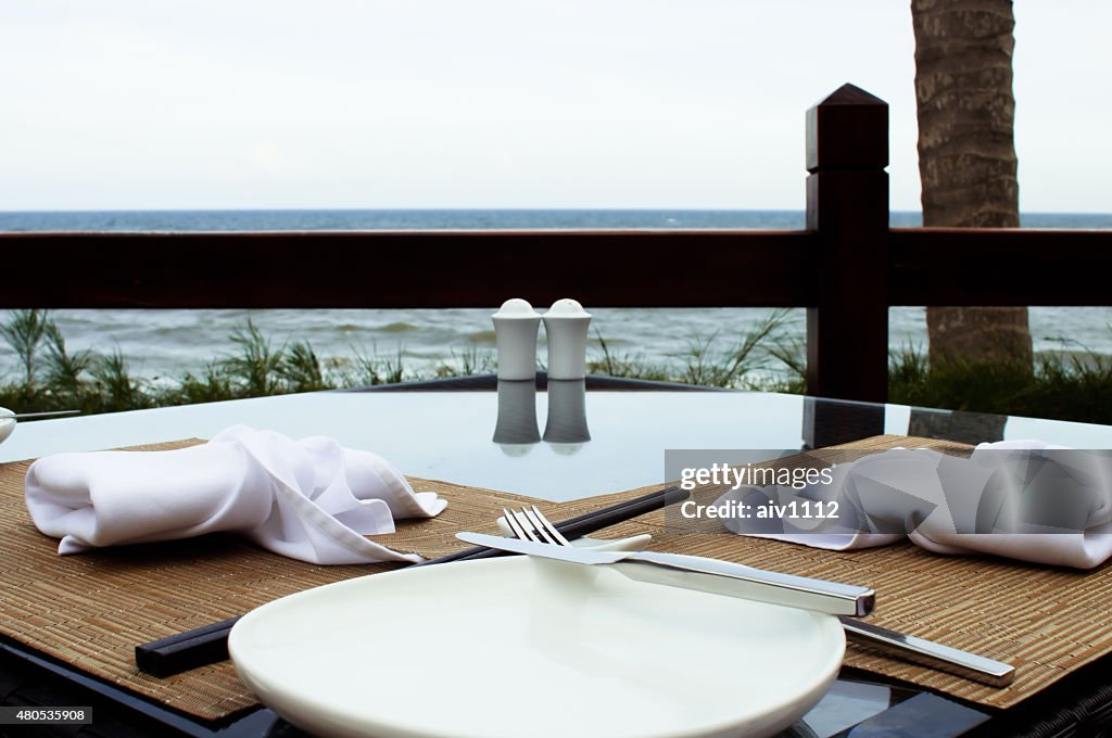 Outdoors decorated table with a sea view