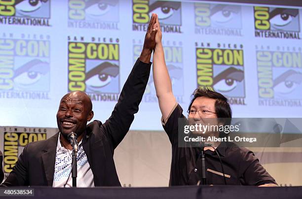 Actors Jimmy Jean-Louis and Masi Oka speak onstage at the "Heroes Reborn" exclusive extended trailer and panel during Comic-Con International 2015 at...
