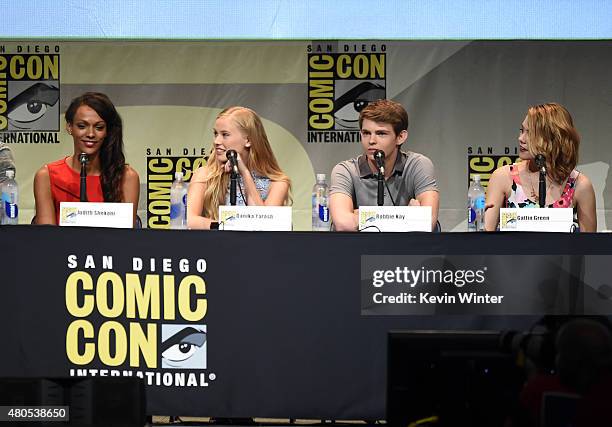 Actors Judith Shekoni, Danika Yarosh, Robbie Kay, and Gatlin Green speak onstage at the "Heroes Reborn" exclusive extended trailer and panel during...