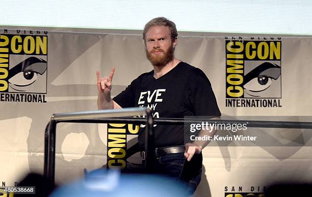 Actor Henry Zebrowski walks onstage at the "Heroes Reborn" exclusive extended trailer and panel during Comic-Con International 2015 at the San Diego...
