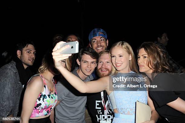 Actress Danika Yarosh takes a selfie with cast and crew at the "Heroes Reborn" exclusive extended trailer and panel during Comic-Con International...