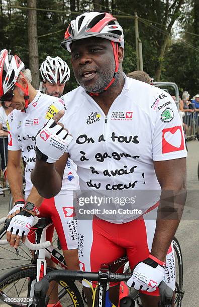 Basile Boli participates at a charity event benefitting 'Mecenat Chirurgie Cardiaque', riding the same stage as the professionals, an hour before...