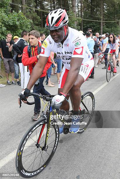 Basile Boli participates at a charity event benefitting 'Mecenat Chirurgie Cardiaque', riding the same stage as the professionals, an hour before...