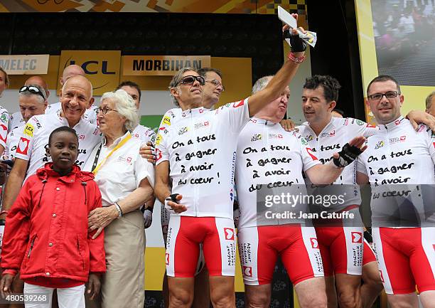 Paul Belmondo takes a selfie after participating at a charity event benefitting 'Mecenat Chirurgie Cardiaque', riding the same stage as the...