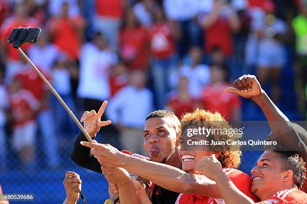 Stiven Tapiero of America de Cali celebrates celebrates taking a selfie after scoring the second goal of his team during a match between America de...