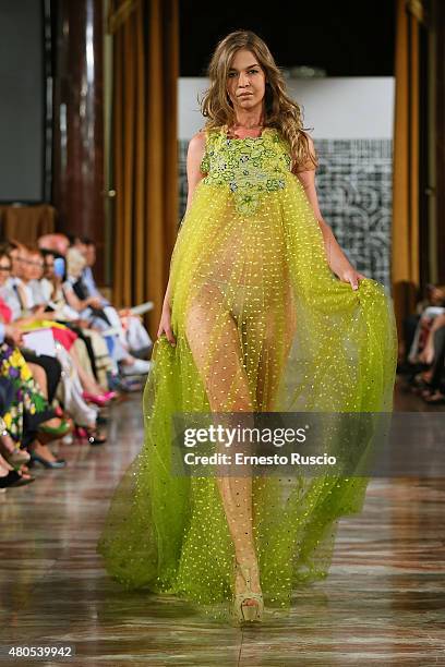 Model walks during the Michelle Salins fashion show, as a part of AltaRoma AltaModa Fashion Week Fall/Winter 2015/16 at ST Regis Hotel on July 12,...