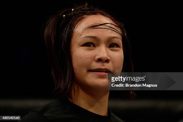 Michelle Waterson awaits the final decision in her women's strawweight bout during the Ultimate Fighter Finale inside MGM Grand Garden Arena on July...