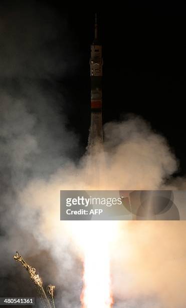 Russian Soyuz-FG rocket with the Soyuz TMA-12M spacecraft and a crew of US astronaut Steven Swanson, Russian cosmonauts Alexander Skvortsov and Oleg...