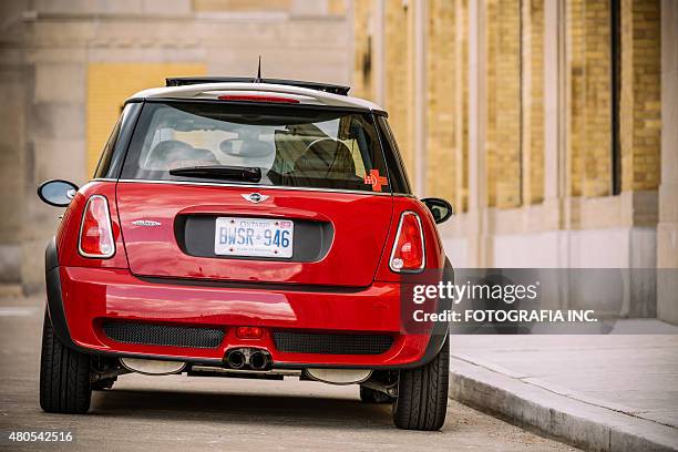 chilli red mini cooper s jcw - rear view of car stock pictures, royalty-free photos & images