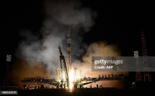 Russian Soyuz-FG rocket with the Soyuz TMA-12M spacecraft and a crew of US astronaut Steven Swanson, Russian cosmonauts Alexander Skvortsov and Oleg...