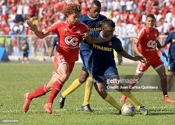 Stiven Tapiero of America de Cali and Aldayr Hernández of Bogota FC fights for the ball during a match between America de Cali and Bogota FC as part...