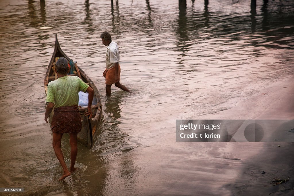 Fishermen in early morning. Cochin, India