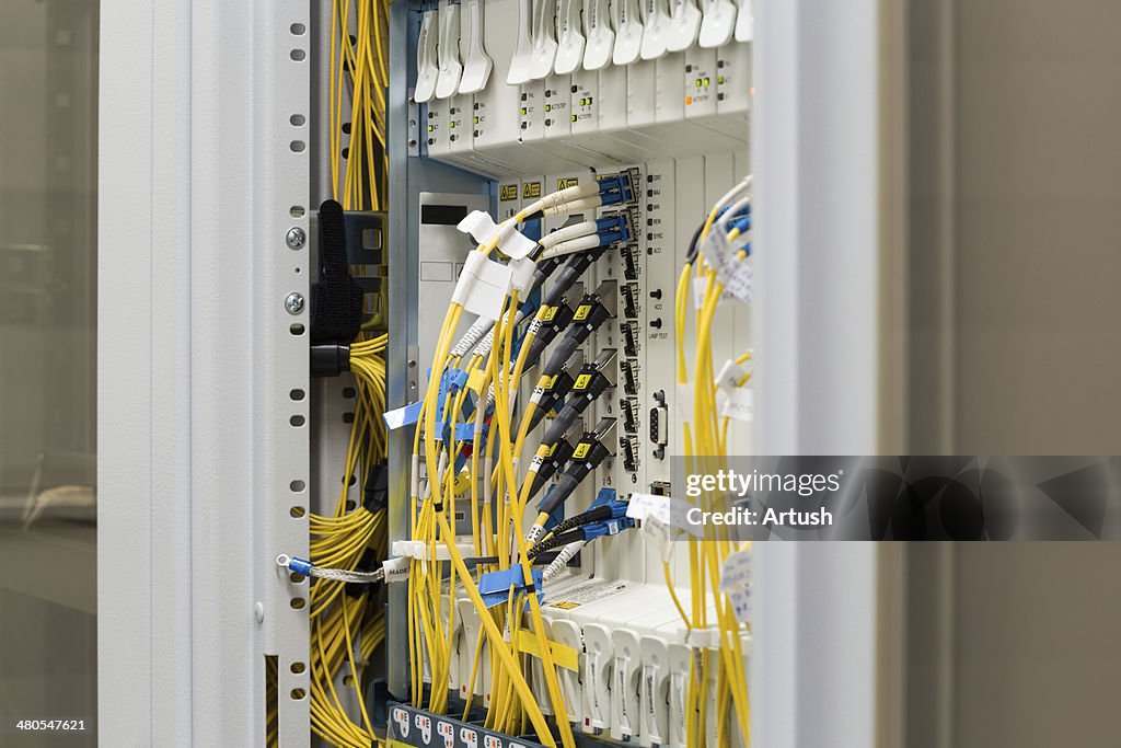 Fiber optic datacenter with media converters and optical cables