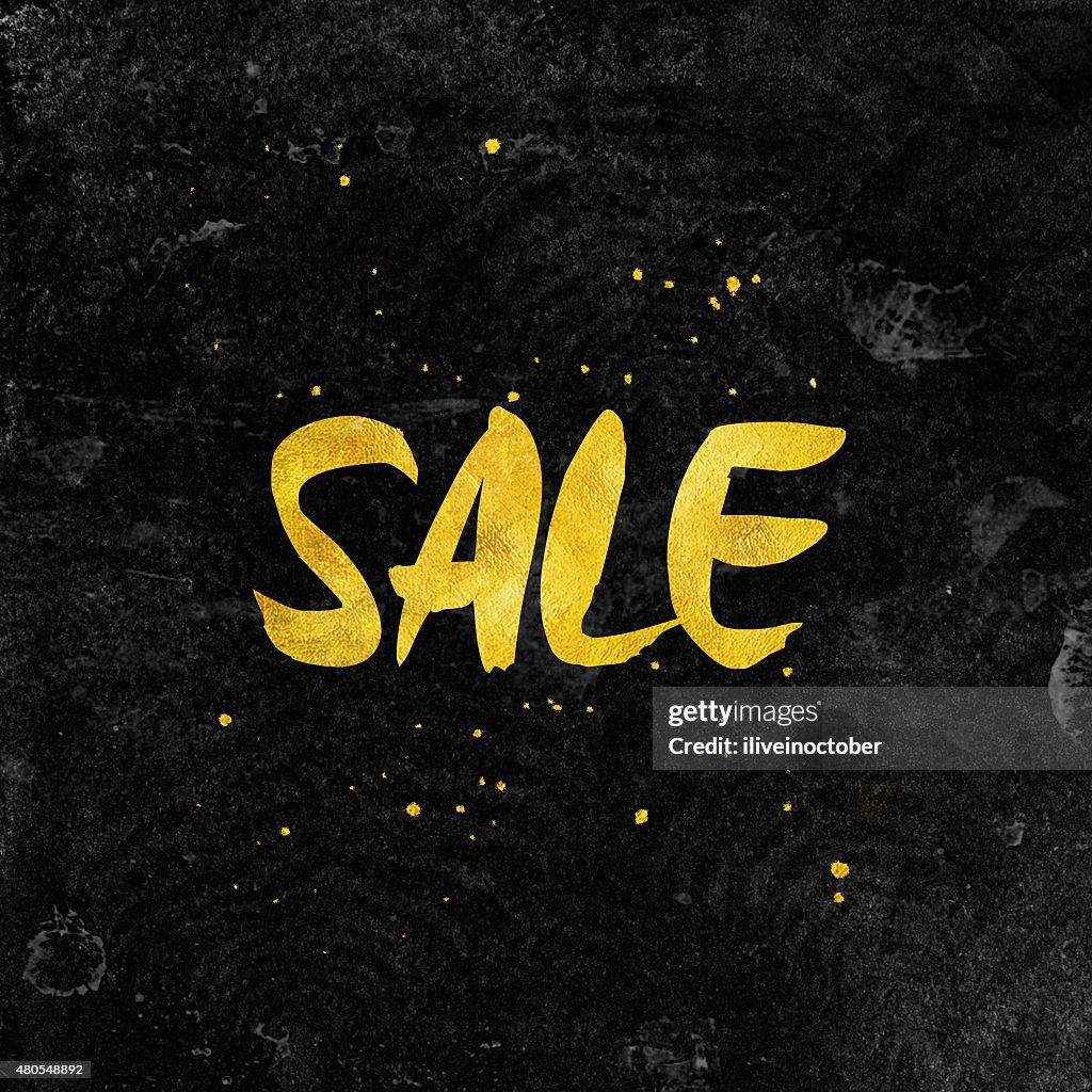 Black SALE typography background with gold foil letters.