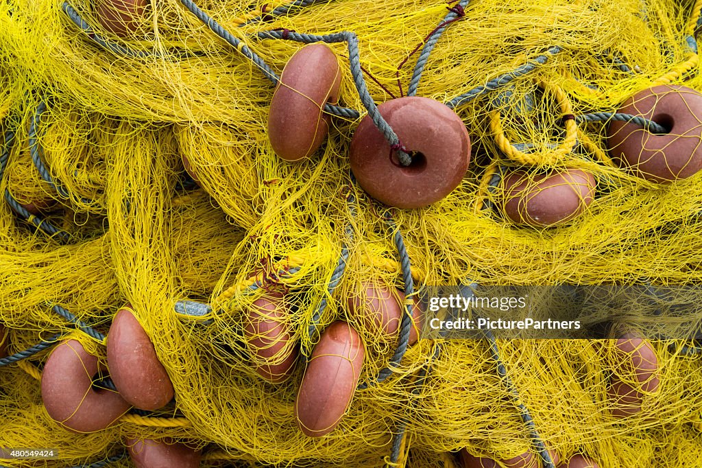 Old yellow fishing nets