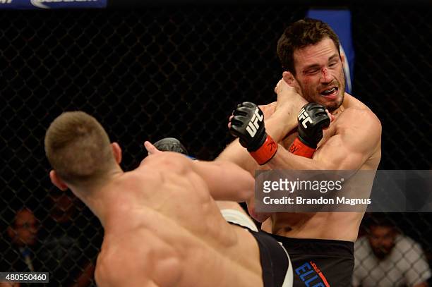 Stephen Thompson kicks Jake Ellenberger in their welterweight bout during the Ultimate Fighter Finale inside MGM Grand Garden Arena on July 12, 2015...