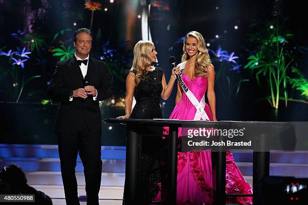 Hosts Todd Newton and Former Miss Wisconsin Alex Wehrley speak onstage with Miss Oklahoma Olivia Jordan at the 2015 Miss USA Pageant Only On...