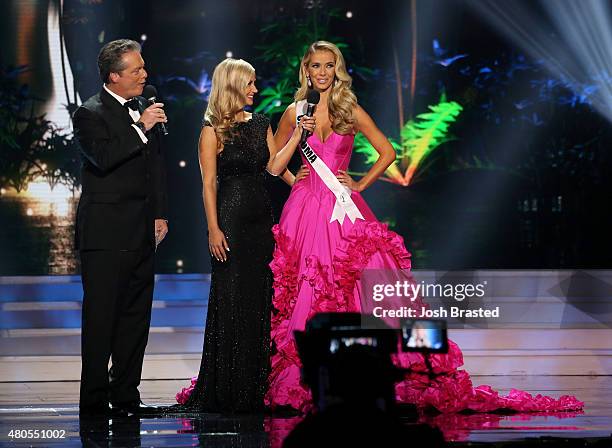 Hosts Todd Newton and Former Miss Wisconsin Alex Wehrley speak onstage with Miss Oklahoma Olivia Jordan at the 2015 Miss USA Pageant Only On...