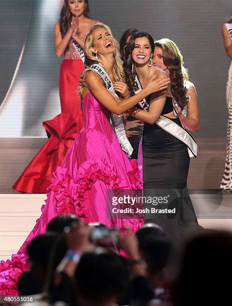 Miss USA 2015 Olivia Jordan of Oklahoma receives her sash onstage from Miss Universe 2014 Paulina Vega at the 2015 Miss USA Pageant Only On...