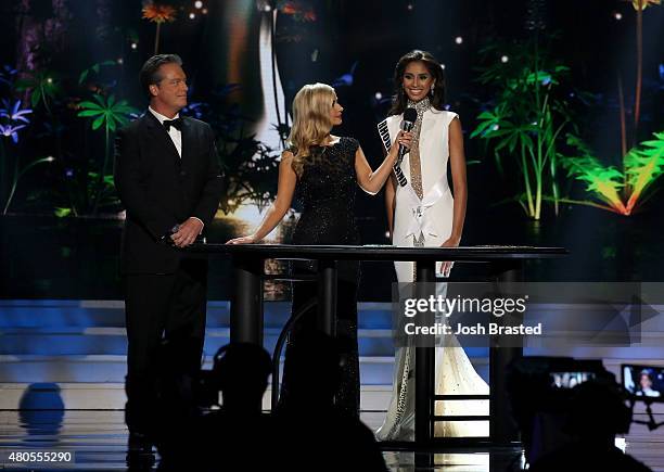Hosts Todd Newton and Former Miss Wisconsin Alex Wehrley speak on stage with Miss Rhode Island Anea Garcia at the 2015 Miss USA Pageant Only On...